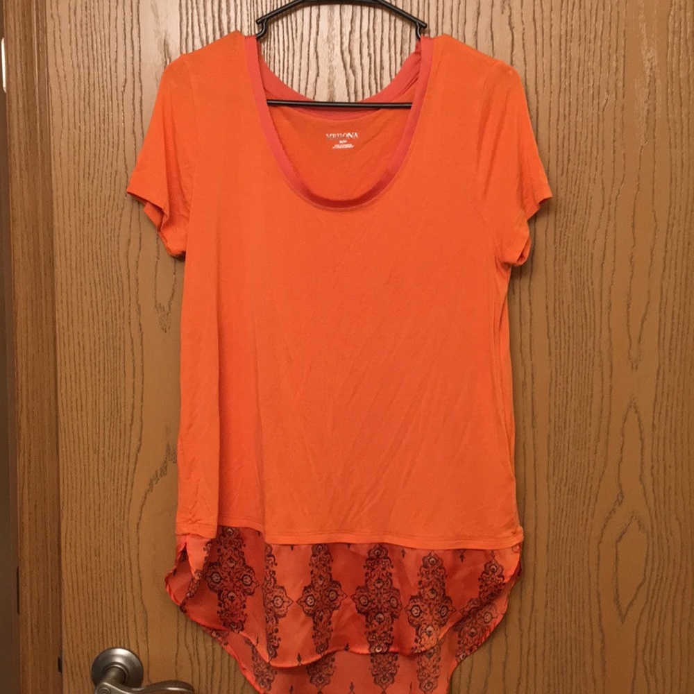 Orange blouse with design around bottom